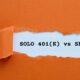 Orange construction paper ripped out enough to show words that say Solo 401(k) vs SEP IRA